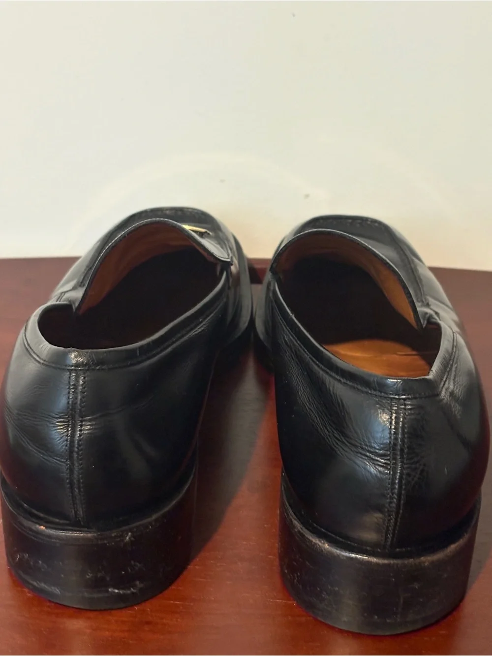 Gucci Black Leather Slip-On Loafers with Gold Plaque